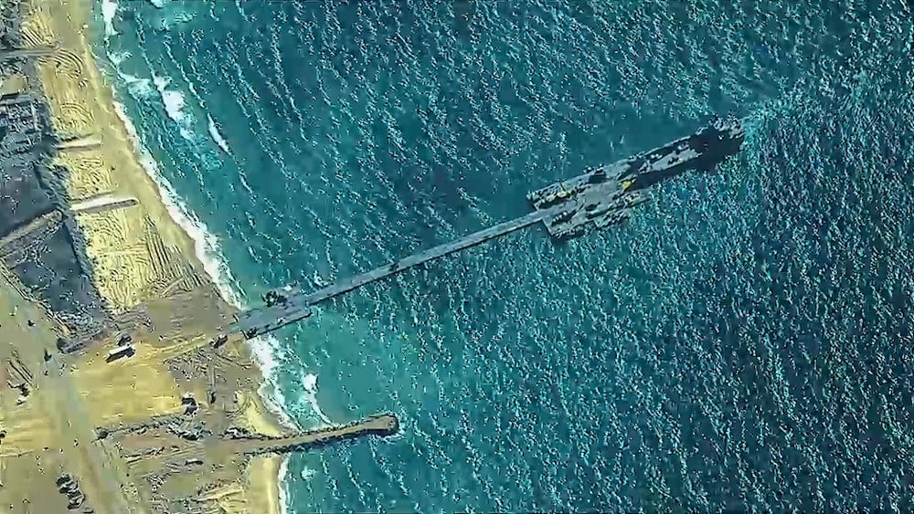 The image provided by U.S, Central Command, shows US Army soldiers, US Navy sailors, and Israeli occupation dorces placing the Trident Pier on the coast of Gaza Strip on Thursday, May 16, 2024