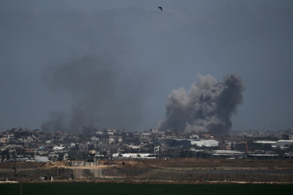 Smoke rises following an Israeli airstrike in the Gaza Strip, as seen from southern occupied Palestine, Thursday, May 16, 2024. (AP)