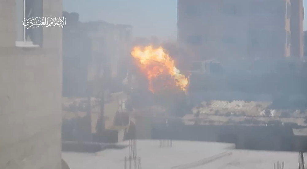 A screenshot from a video showing al-Qassam Brigades targeting gatherings of IOF soldiers and vehicles in Rafah on May 17, 2024. (Al-Qassam Brigades Military Media)