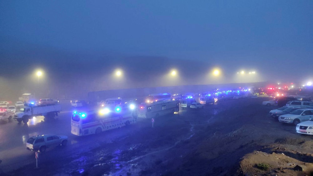 Rescue vehicles are seen following a crash of a helicopter carrying Iran's President Ebrahim Raisi, in Varzaqan , northwestern Iran on May 19 2024 (AFP)