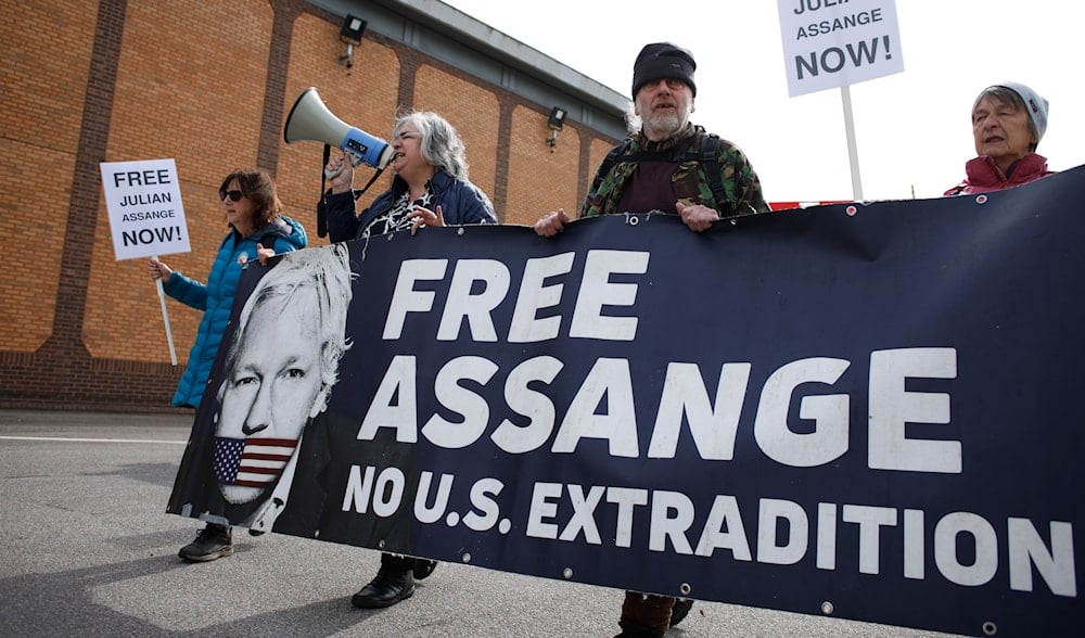 Activists marking five years since the arrest of Wikileaks founder Julian Assange demonstrate outside Belmarsh Prison in London, Sunday, April 14, 2024. (AP)