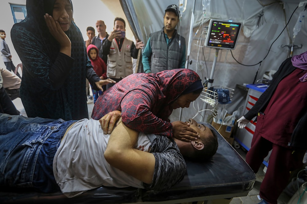 lestinians mourn their relatives killed in The Israeli bombardment of the Gaza Strip, at a hospital in Rafah, Gaza, Friday, May 10, 2024. (