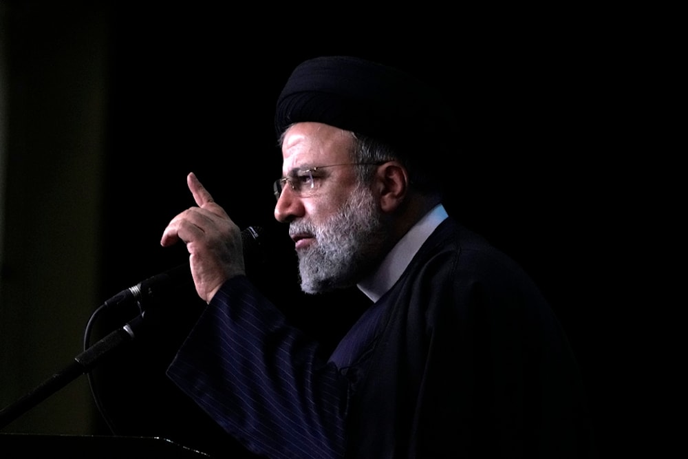 Iranian President Ebrahim Raisi speaks during a commemoration for the late Revolutionary Guard Gen. Qassem Soleimani, Jan. 3, 2024, in Tehran, Iran (AP)