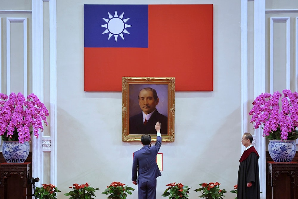 In this photo released by the Taipei News Photographer, President-elect Lai Ching-te gets sworn in as Taiwan's new president during his inauguration ceremony in Taipei, Taiwan, Monday, May 20, 2024 (AP)