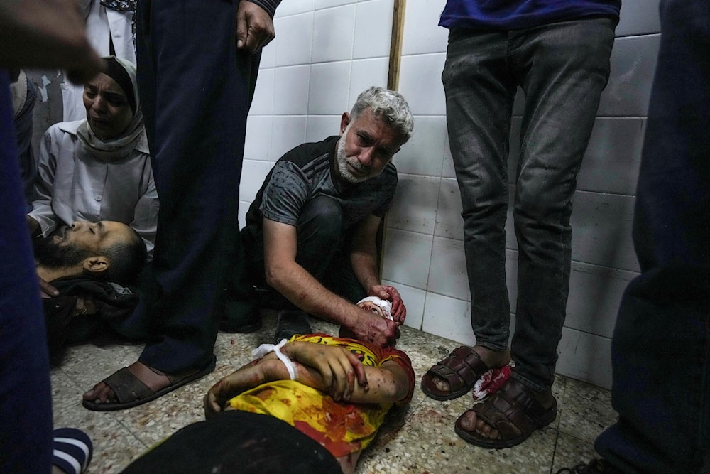 Palestinians mourn their relatives killed in the Israeli bombardment of the Gaza Strip, at the al-Aqsa hospital in Deir al-Balah, Gaza, Thursday, May 9, 2024.(AP