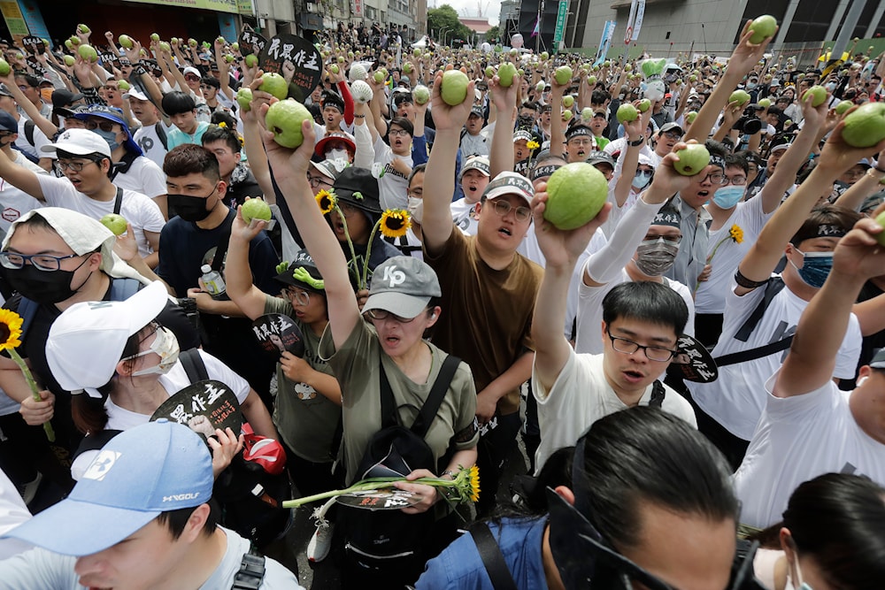 Supporters of opposition Taiwan People's Party (TPP) during a march to protest against Lai Ching-te's ruling Democratic Progressive party in Taipei, Taiwan, Sunday, May 19, 2024. (AP)