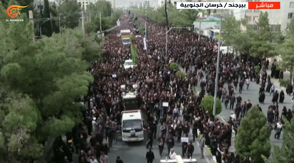 Millions of Iranians take part in the funeral procession of Iranian President Ebrahim Raisi in the Khorasan Province in Iran on May 23, 2024.  (Al Mayadeen)