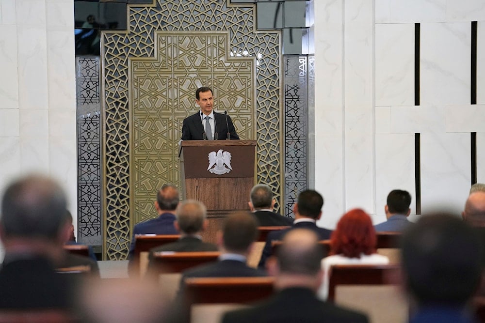 In this photo released by the Syrian official news agency SANA, Syrian President Bashar al-Assad addresses the parliament, in Damascus, Syria, Wednesday, Aug. 12, 2020. (AP)