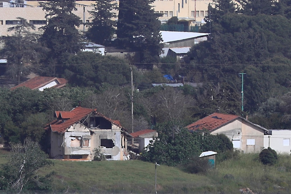  An Israeli settler house in the northern Israeli-occupied border town of Metula, which was damaged by Hezbollah shelling, is seen from the Lebanese side of the Lebanese-Israeli border village of Kfar Kila, south Lebanon, Thursday, April 18, 2024. (AP)
