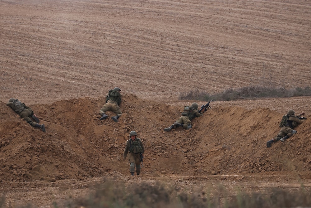 Israeli occupation forces take position near Gaza, southern occupied Palestine, Monday, Oct. 9, 2023. (AP)