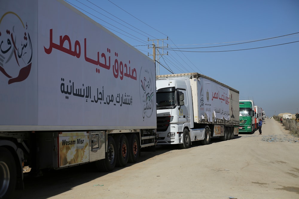 Trucks carrying humanitarian aid enter the Gaza Strip from Egypt in Rafah during a previous temporary ceasefire that went into effect Friday, Nov. 24, 2023. (AP)