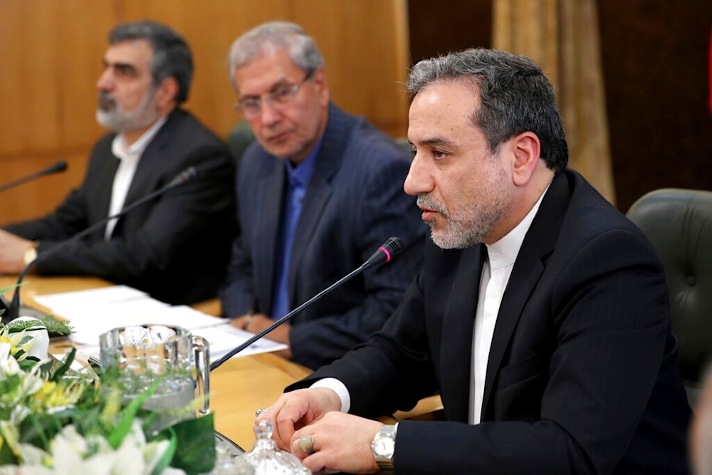 Iran's (at that time) Deputy Foreign Minister Abbas Araghchi, right, speaks in a press briefing in Tehran, Iran, Sunday, July 7, 2019 (AP Photo/Ebrahim Noroozi)