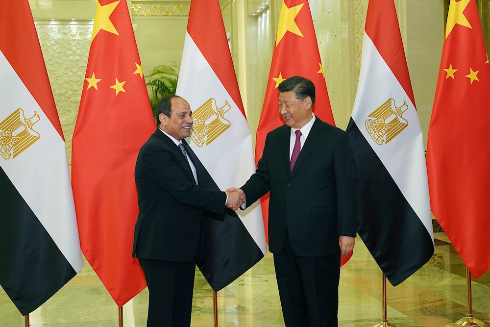 Chinese President Xi Jinping, right, shakes hands with Egypt President Abdel Fattah el-Sisi before a bilateral meeting of the Second Belt and Road Forum at the Great Hall of the People on Thursday, April 25, 2019 in Beijing, China.(AP)
