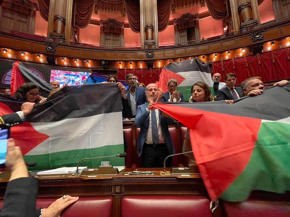 Italian 5 star movement MPs raise Palestinian flag in the Italian parliament, 28 March, 2024 (Social Media)
