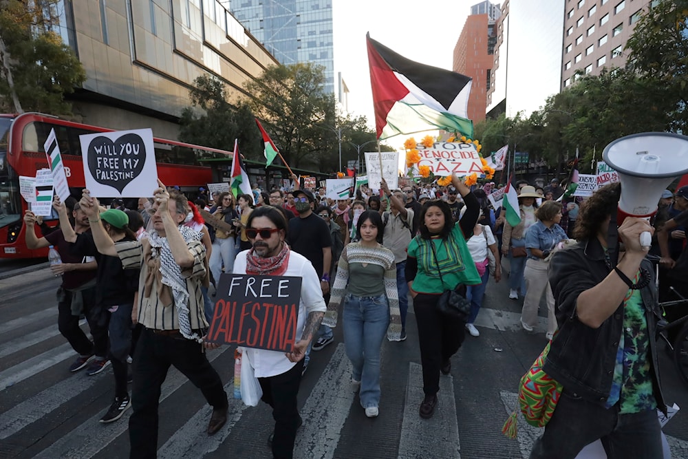 People march against the Israeli war on Gaza and in support of the Palestinians in Gaza, in Mexico City, Sunday, Nov. 5, 2023. (AP)