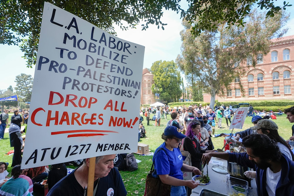 UCLA workers, students and supporters get lunch after a rally at Royce Quad in the University of California, Los Angeles, UCLA campus Tuesday, May, 28, 2024 (AP)