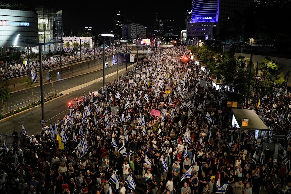 Israelis protest against Israeli Prime Minister Benjamin Netanyahu as they call for the release of captives on May 18, 2024. (AP)