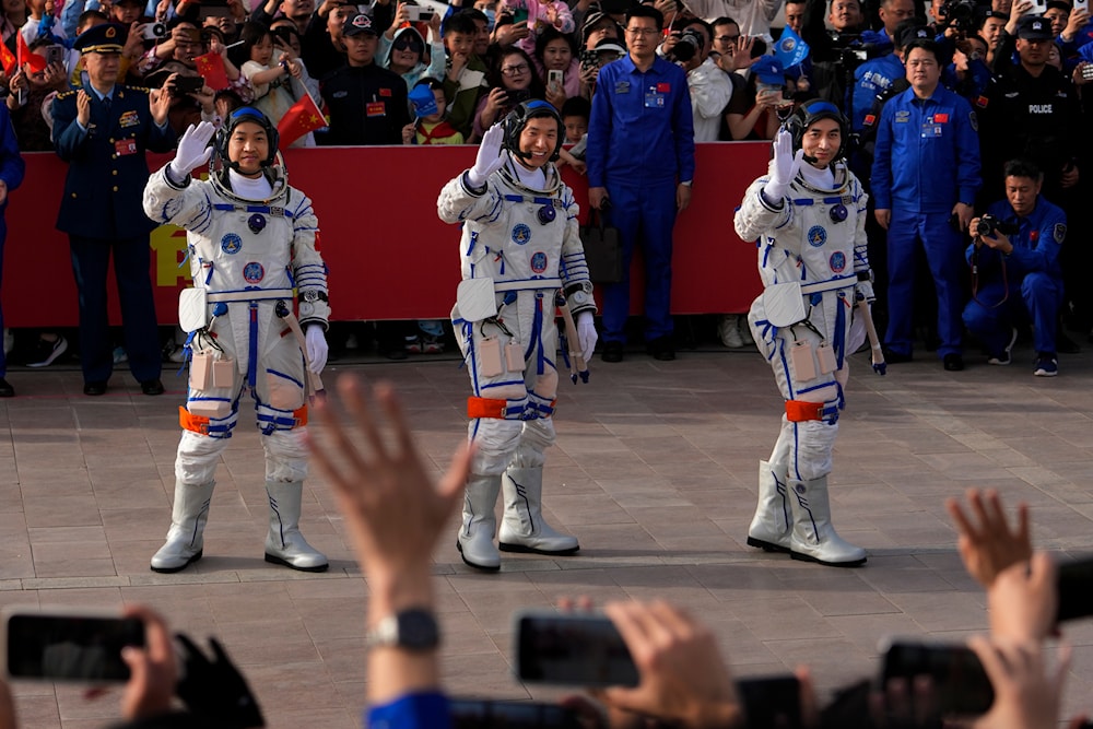 Chinese astronauts for the Shenzhou-18 mission - Ye Guangfu, Li Cong, and Li Guangsu as they attend a send-off ceremony at the Jiuquan Satellite Launch Center in China, Thursday, April 25, 2024. (AP)