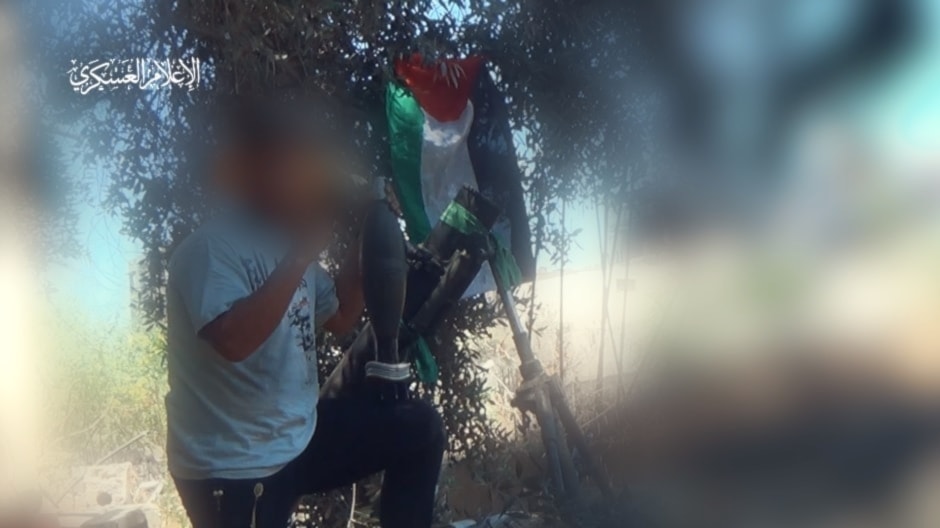 A screengrab from a video shared by the Palestinian Resistance showing its fighters firing mortar shells at Israeli occupation sites. (Military media)