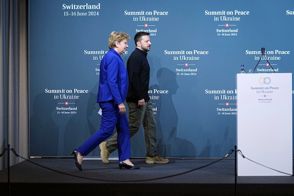 Swiss Federal President Viola Amherd and Ukraine's President Volodymyr Zelenskyy arrive at a news conference during the Ukraine peace summit in Buergenstock, Switzerland, June 15, 2024. (AP)