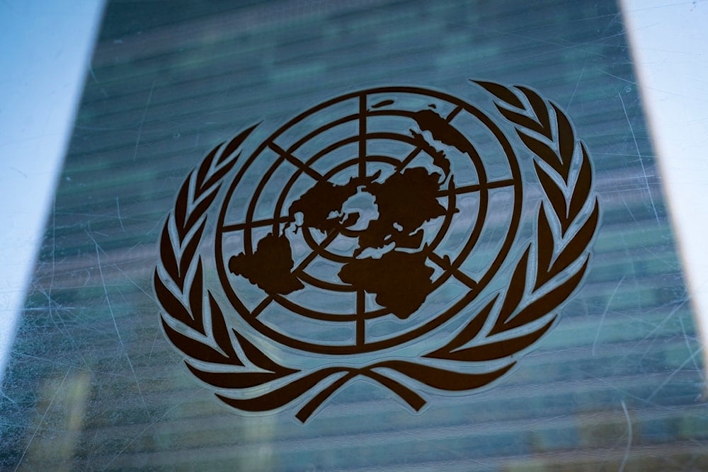 The symbol of the United Nations is displayed outside the Secretariat Building, Feb. 28, 2022, at United Nations Headquarters. (AP)