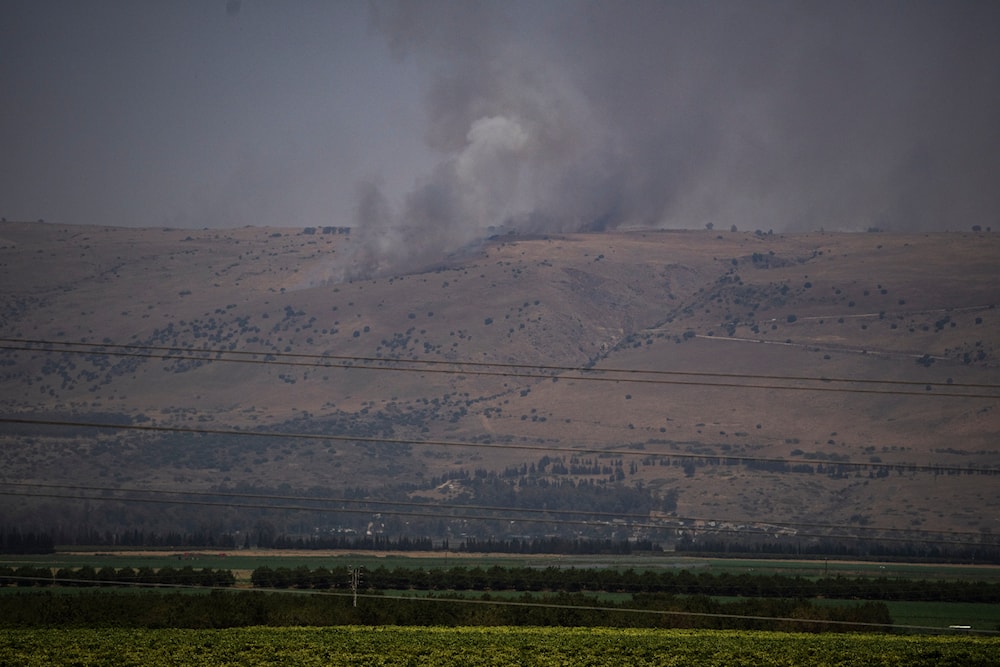 Smoke rises to the sky as a fire burns an area after a Lebanese shelling, in the occupied Golan, on June 13, 2024. (AP)