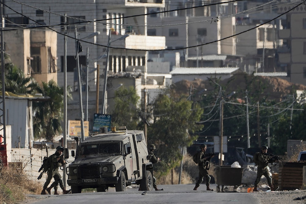 Israeli forces operate in the Balata refugee camp, in the West Bank city of Nablus, on June 1, 2024. (AP)