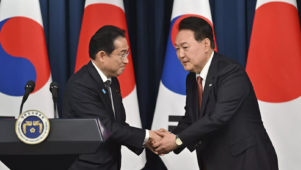 Japan, South Korea agree to resume defense exchanges