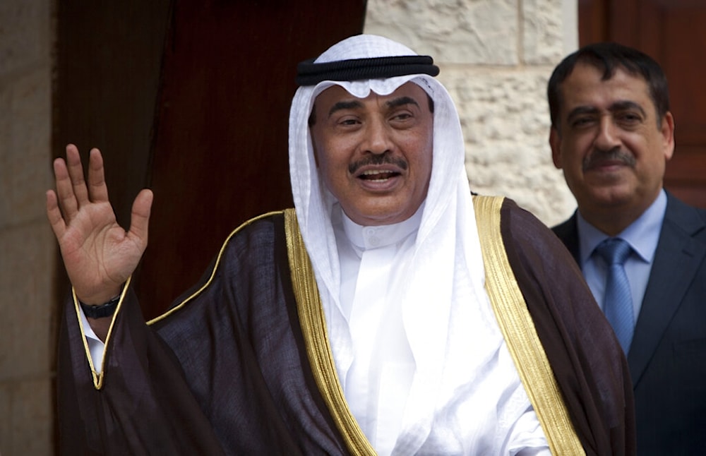 Kuwaiti then-Foreign Minister, now Crown Prince, Sheikh Sabah Khaled Al Hamad Al Sabah waves as he arrives in the West Bank city of Ramallah, occupied Palestine, Sept. 14, 2014. (AP)