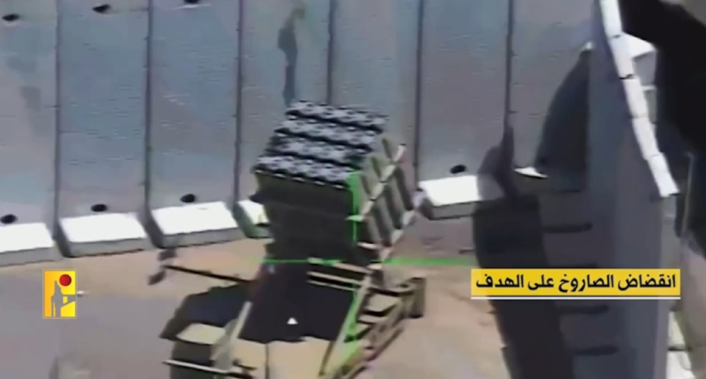 A screengrab from a video posted by the Islamic Resistance in Lebanon depicting the moment an Iron Dome missile launching platform was hit with an Almas Missile (Military Media of the Islamic Resistance in Lebanon)