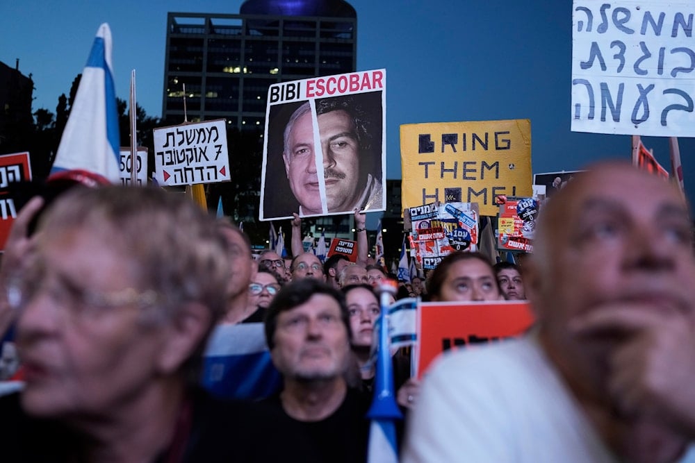 People protest against Israeli Prime Minister Benjamin Netanyahu's government and call for the release of captives held in Gaza in Tel Aviv, occupied Palestine, May 18, 2024 (AP) 