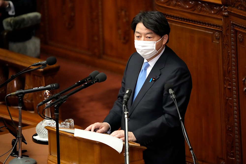 Japanese Foreign Minister Yoshimasa Hayashi delivers a speech at the lower house on January 17, 2022, in Tokyo. (AP)