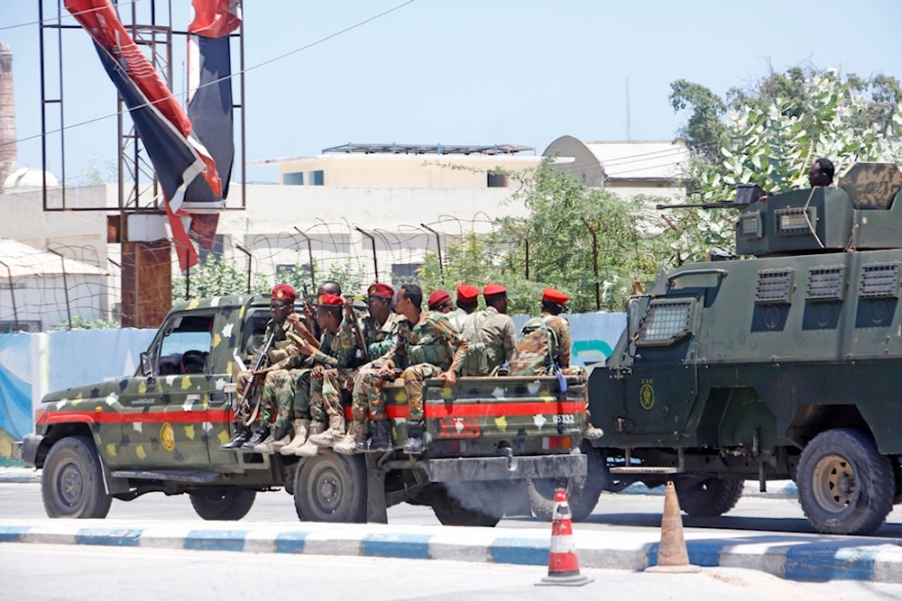 Somalia security officers patrol near the SYL hotel building which was attacked on Thursday by al-Shabab Islamic extremist rebels in Mogadishu, Somalia, Friday March 15, 2024. (AP)