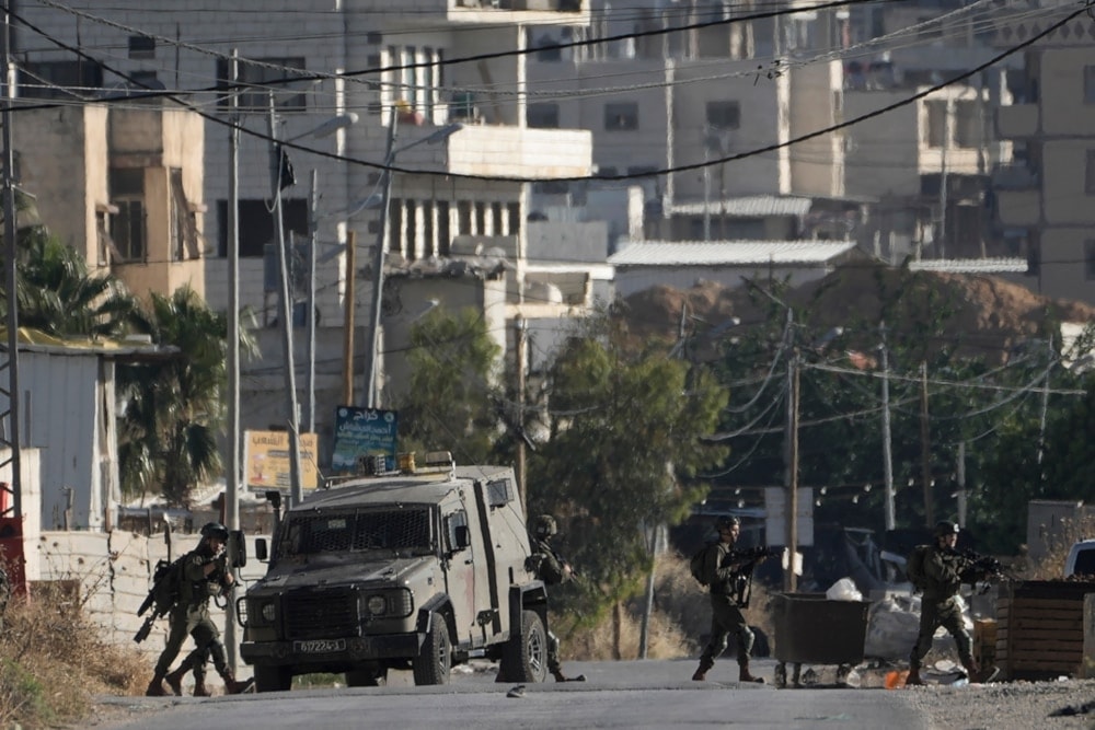 Israeli occupation forces carry out a raid in the Balata refugee camp, in the West Bank city of Nablus, on June 1, 2024. (AP)