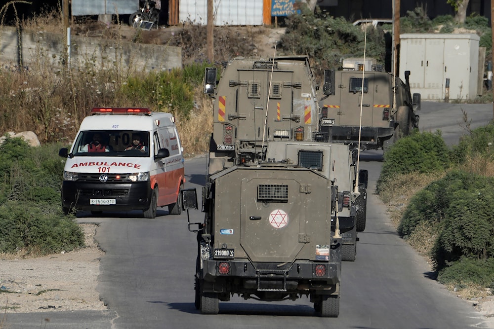 A Palestinian ambulance waits as Israeli forces operate in the Balata refugee camp in the West Bank city of Nablus, on June 1, 2024. (AP)