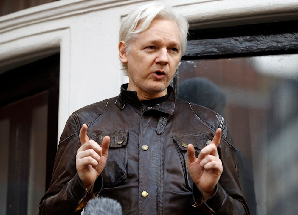 Julian Assange speaks to the media outside the Ecuadorian embassy in London, May 19, 2017. (AP)