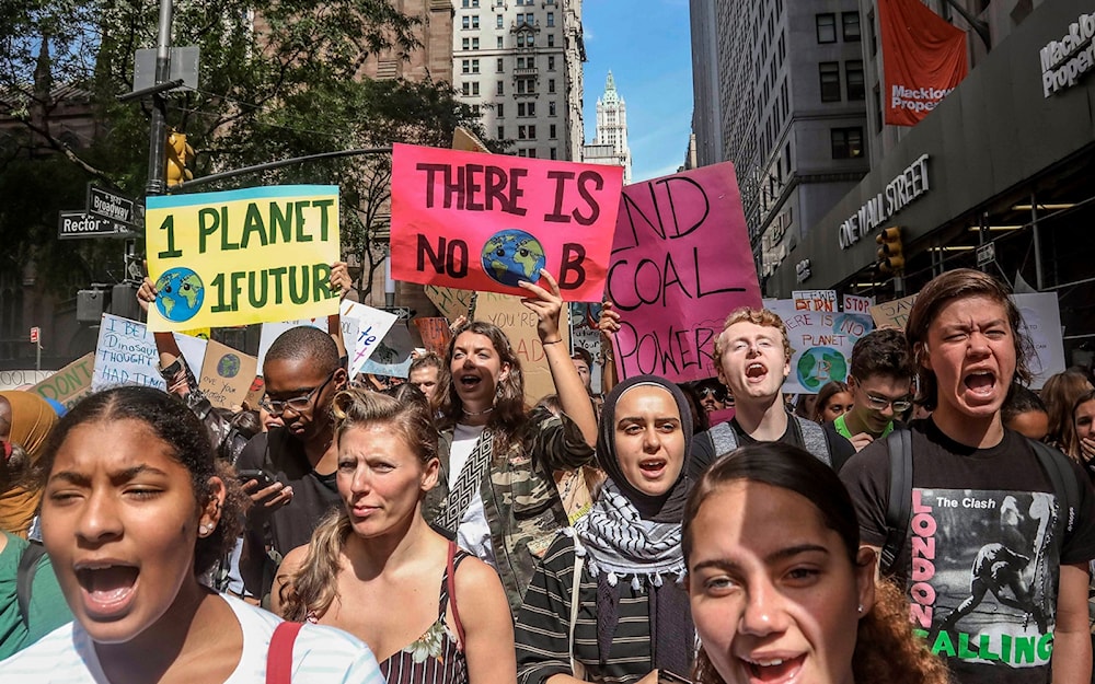 Climate change activists participate in an environmental demonstration as part of a global youth-led day of action, September 20, 2019. (AP)
