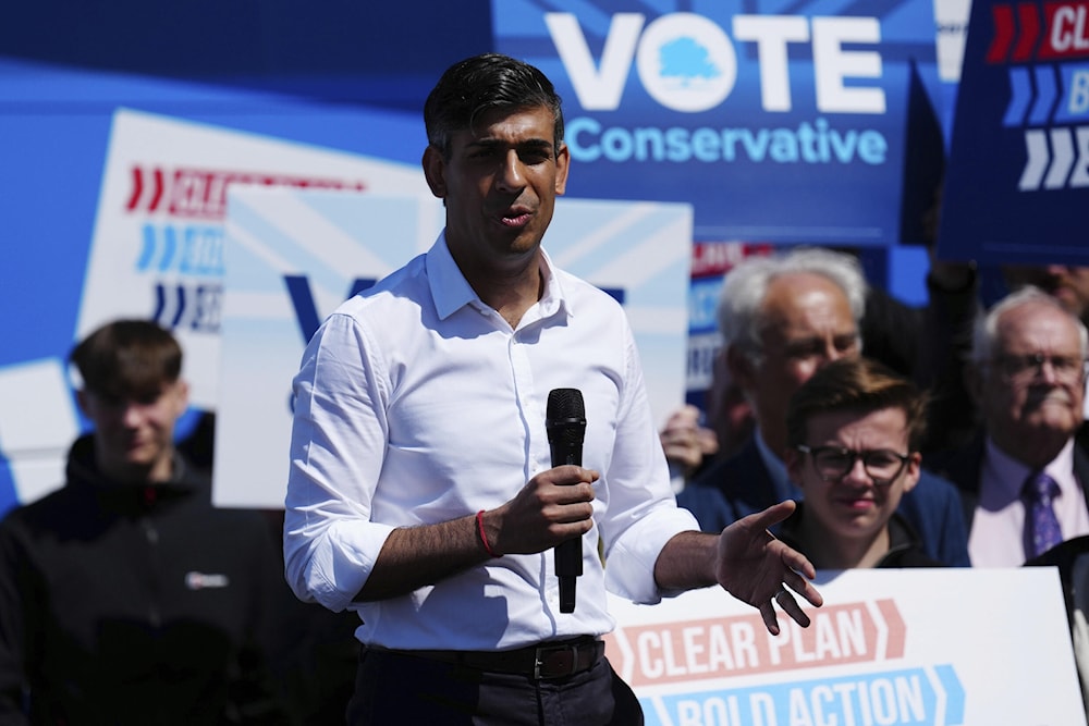 Britain's Prime Minister Rishi Sunak launches the Conservative campaign bus during a speech Saturday, June 01, 2024. (AP)