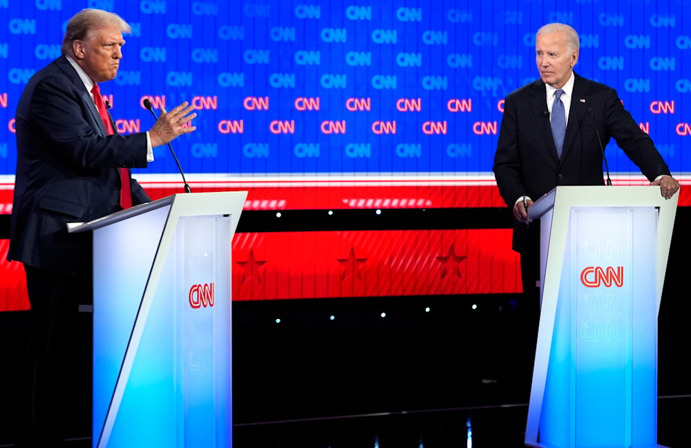 President Joe Biden, right, and Republican presidential candidate former President Donald Trump, left, participate in a presidential debate hosted by CNN, Thursday, June 27, 2024, in Atlanta. (AP)
