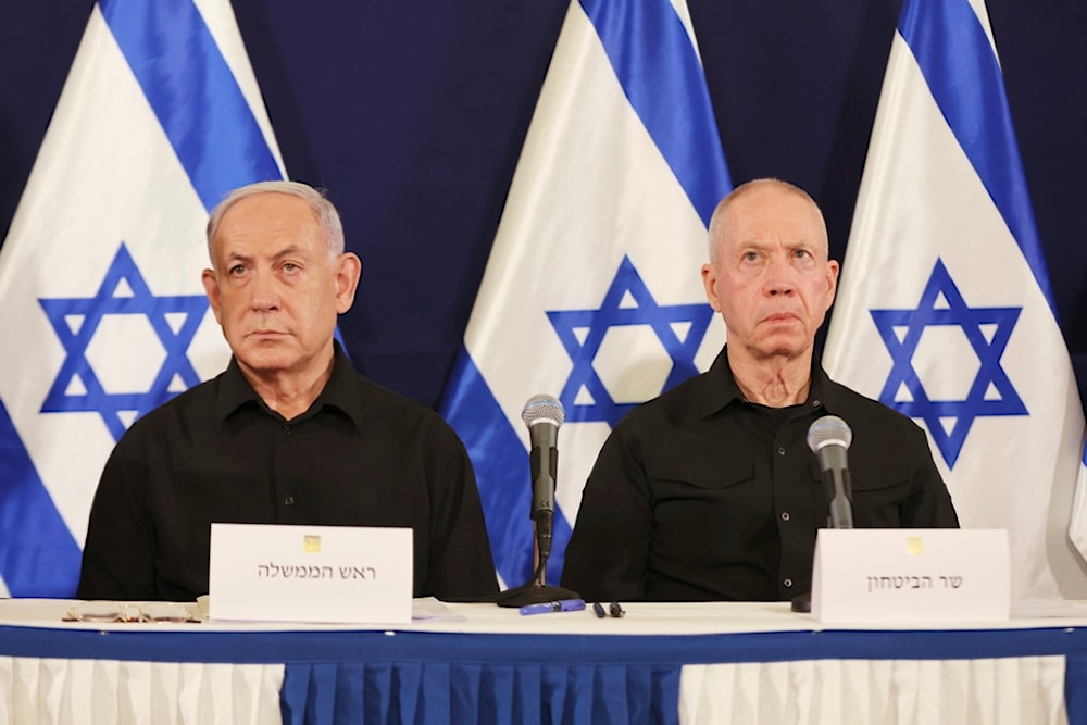 Israeli Prime Minister Benjamin Netanyahu and Defense Minister Yoav Gallant attend a press conference in the Kirya military base in occupied Palestine, Saturday, Oct. 28, 2023. (AP)