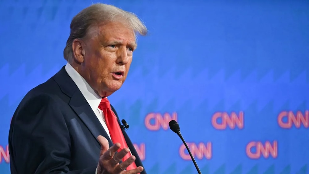 Former US President and Republican presidential candidate Donald Trump speaks as he participates in the first presidential debate of the 2024 elections with US President Joe Biden at CNN’s studios in Atlanta, Georgia, June 27, 2024. (AFP)