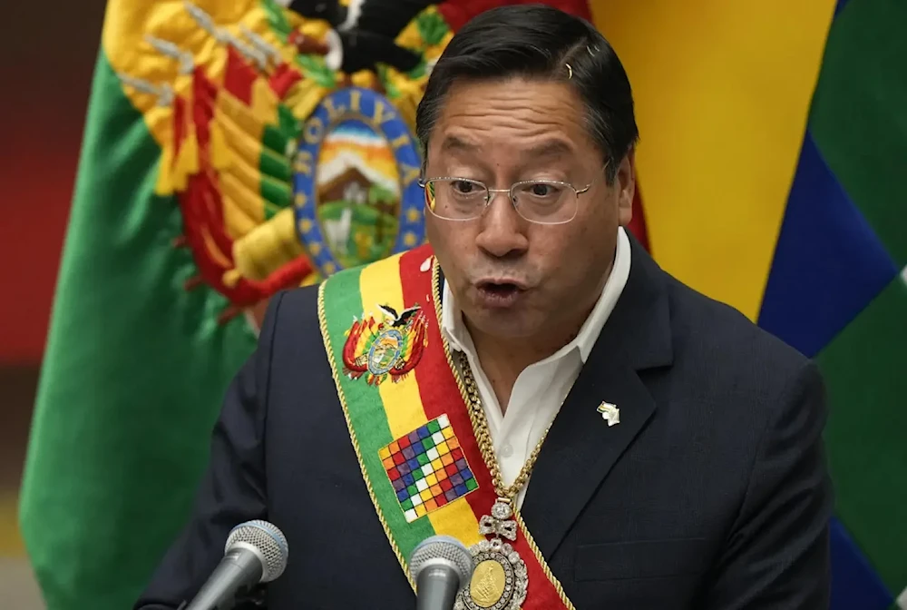 Bolivia’s President Luis Acre addresses the nation at the presidential palace in La Paz, on January 22,2022. (AP)