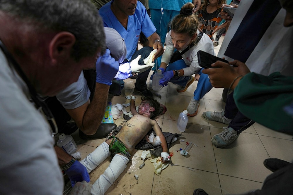 Medics treat a wounded child from an Israeli bombardment of Nuseirat refugee camp, at al-Aqsa Martyrs Hospital in Deir al Balah, central Gaza Strip, Saturday, June 29, 2024. (AP)