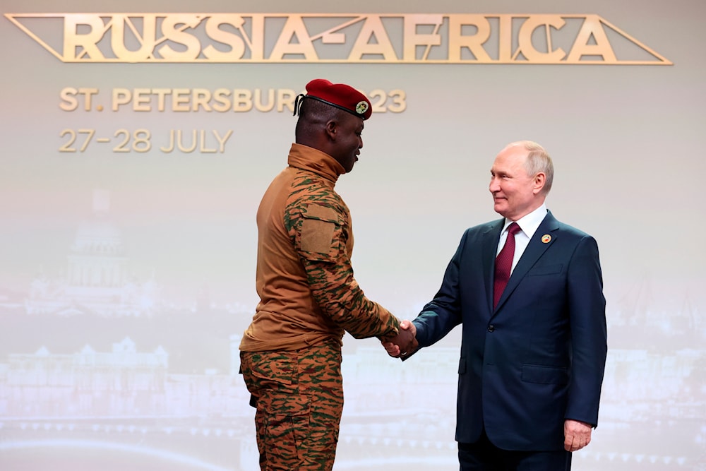 Burkina Faso's Capt. Ibrahim Traore and Russian President Vladimir Putin before an official ceremony at the Russia Africa Summit in St. Petersburg, Russia, Thursday, July 27, 2023. (AP)