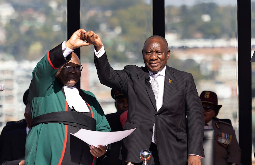 Ramaphosa announces new South African gov. with long-term rivals