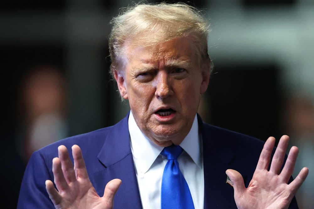 Republican presidential candidate and former US president Donald Trump speaks to reporters at the end of the day's proceedings in his criminal trial at the New York State Supreme Court in New York City, on May 3, 2024. (AFP)