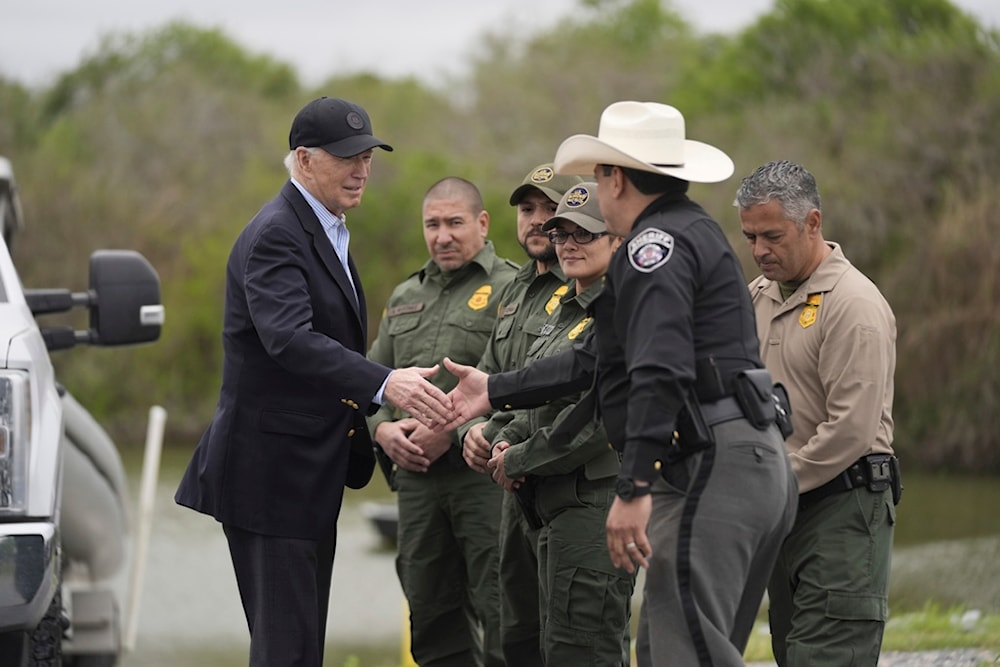 President Joe Biden talks with the U.S. Border Patrol and local officials, as he looks over the southern border, Feb. 29, 2024, in Brownsville, Texas, along the Rio Grande. (AP)