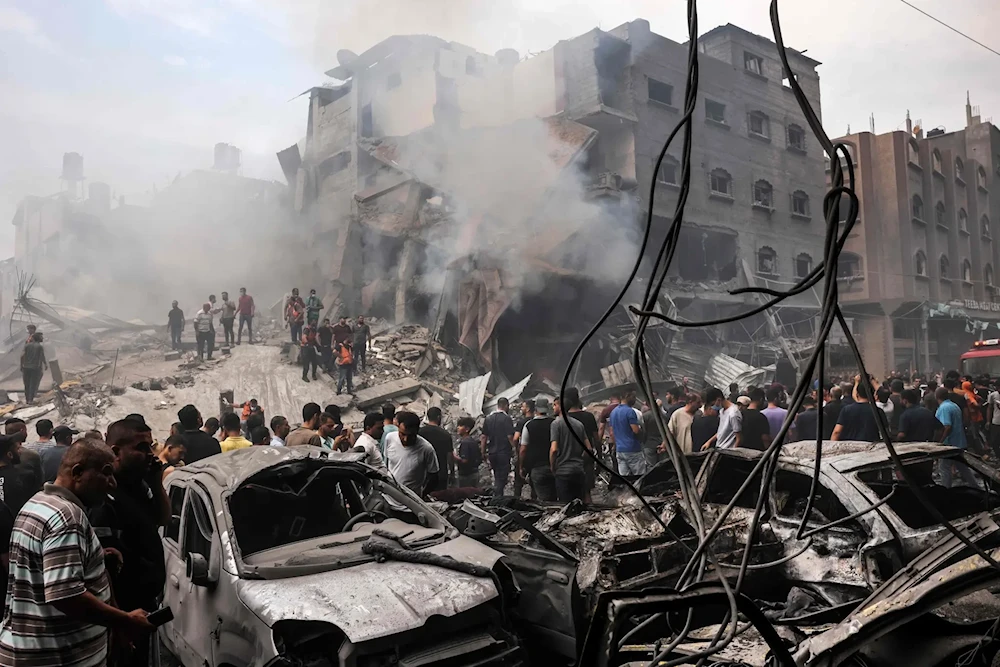An airstrike destroyed buildings and cars around Jabaliya in Gaza on October 2023. (AFP— Getty Images)