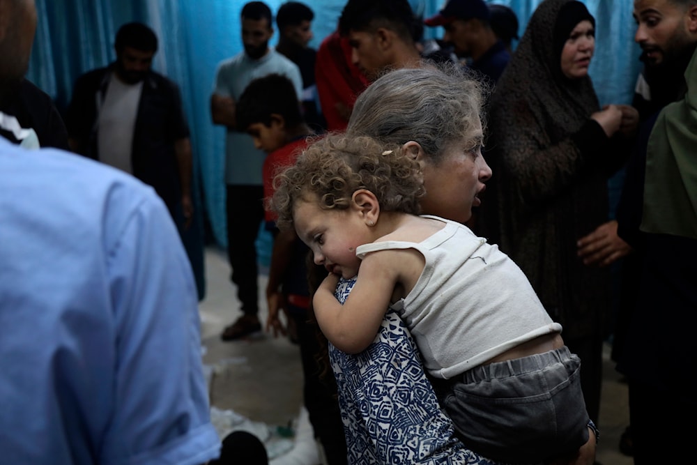 Palestinian children wounded in the Israeli bombardment on a residential building are brought to al-Aqsa Martyrs hospital in Deir al-Balah, June 4, 2024. (AP)