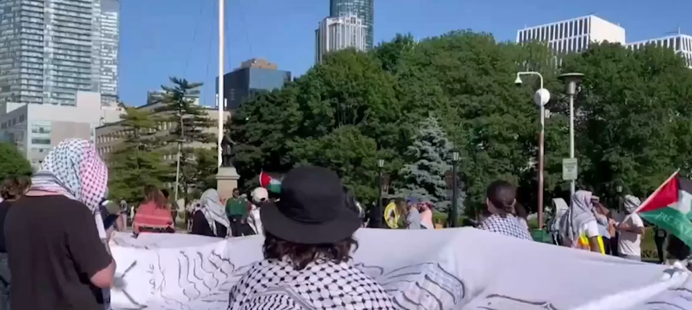 Giant Keffiyeh revealed at Ontario Legislature in response to ban